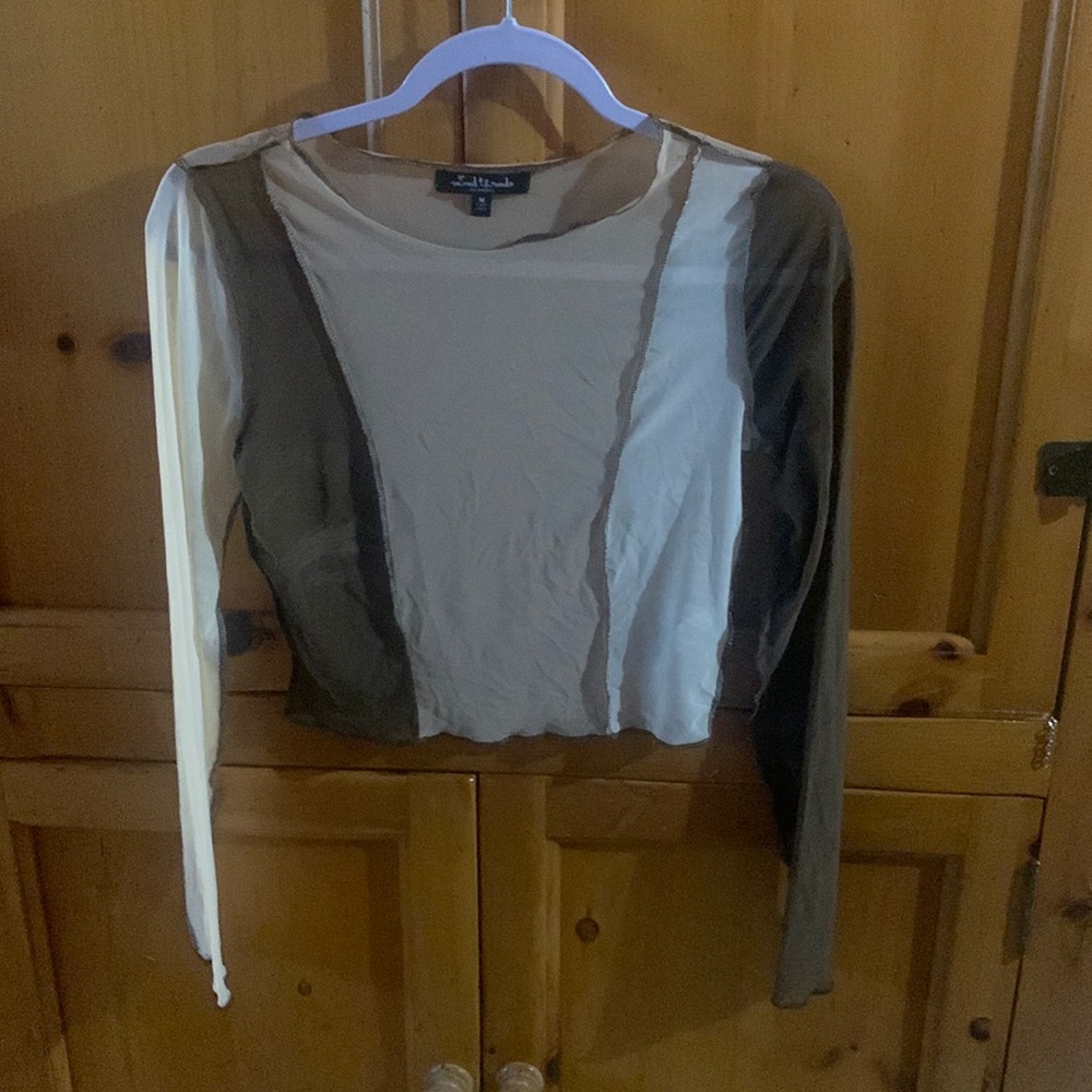 Creamed brown colored see through top size medium